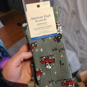 American Eagle Outfitters Green Crew Socks with Snoopy Christmas Pattern